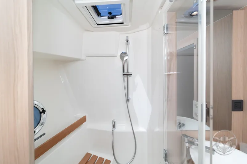 Slide: The Image of Modern bathroom in 2026 Beneteau Swift Trawler 48 yacht, featuring sleek shower design. - 60