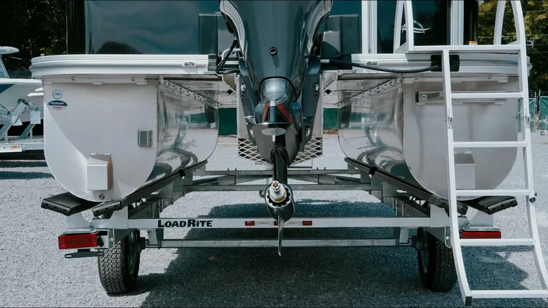 Slide: The Image of 2025 G3 SunCatcher Select 20 Cruise pontoon boat on Load Rite trailer, rear view. - 17