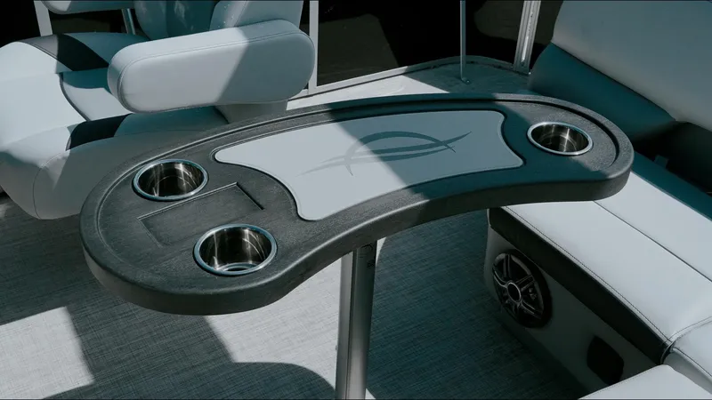 Slide: The Image of 2025 G3 SunCatcher Select 20 Cruise boat table with cup holders and seating. - 2