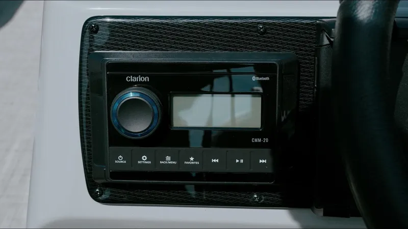Slide: The Image of Clarion audio system on 2025 G3 SunCatcher Select 20 Cruise boat dashboard. - 6
