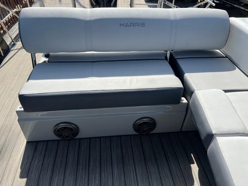 Slide: The Image of 2021 Harris FloteBote 230 Solstice boat seating with integrated speakers. - 11