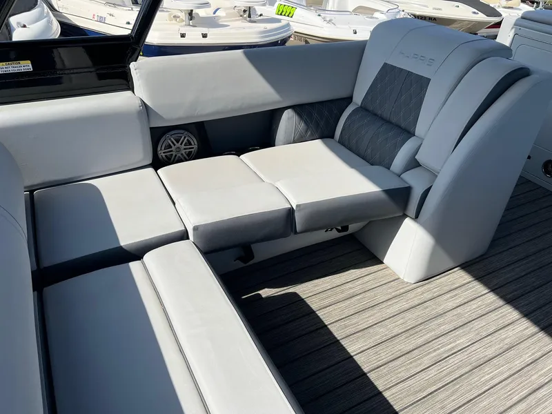 Slide: The Image of 2021 Harris FloteBote 230 Solstice interior with luxurious seating and modern design. - 12