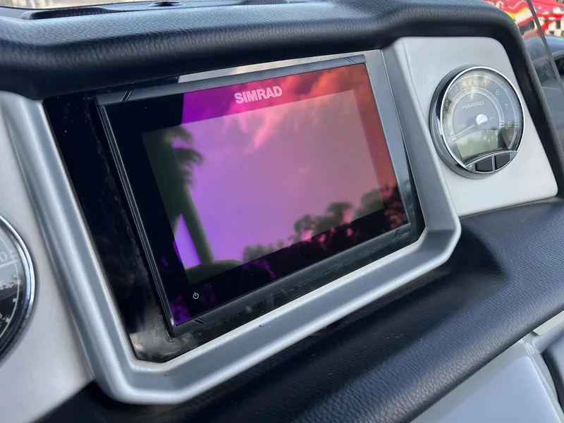 Slide: The Image of Dashboard of 2021 Harris FloteBote 230 Solstice with Simrad display and gauges. - 19