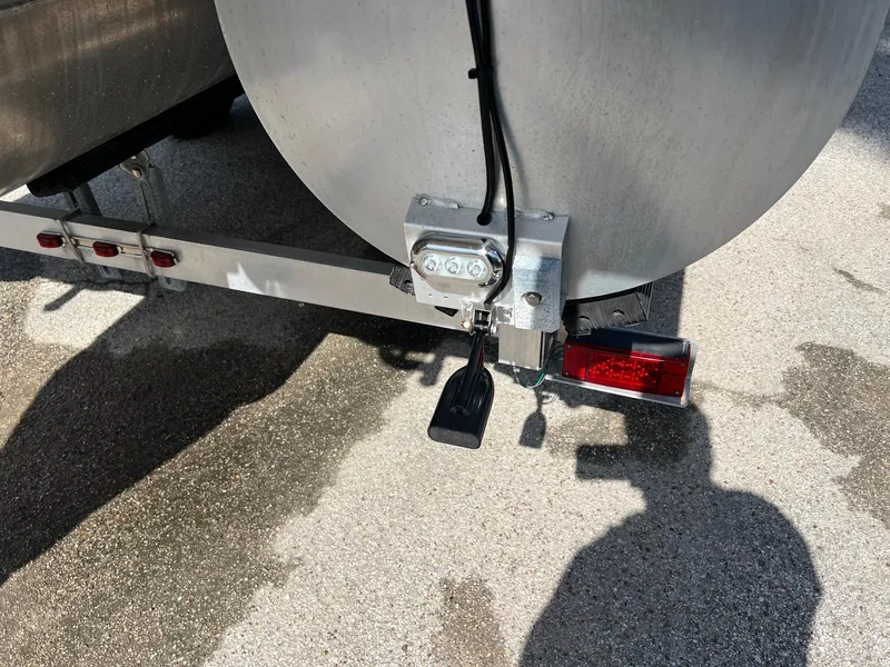 Slide: The Image of Rear view of 2021 Harris FloteBote 230 Solstice pontoon boat trailer with light and wiring. - 33