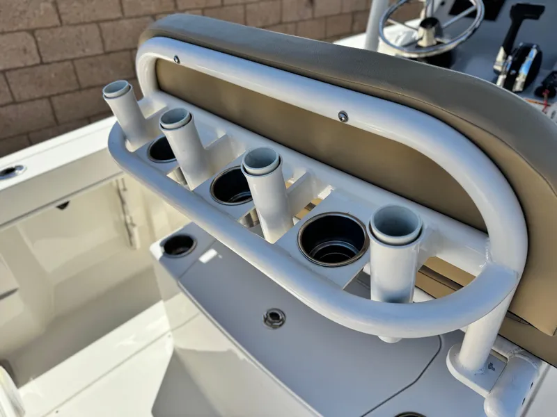 Slide: The Image of 2023 Bayliner Trophy T20CC boat with rod holders and steering console. - 19