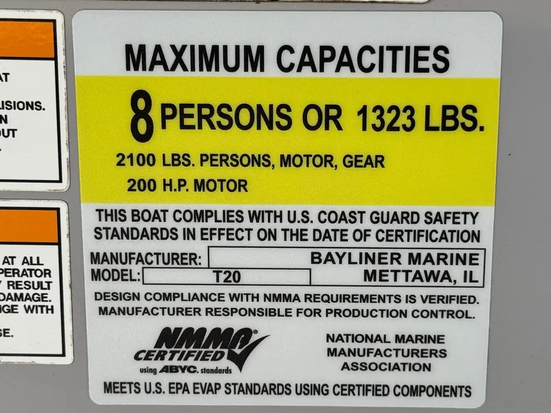 Slide: The Image of 2023 Bayliner Trophy T20CC capacity label: 8 persons or 1323 lbs, 200 HP motor. - 26