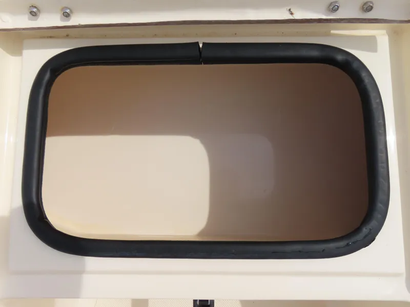 Slide: The Image of KenCraft Challenger 206 boat storage compartment, 2001 model, with black rubber lining. - 12