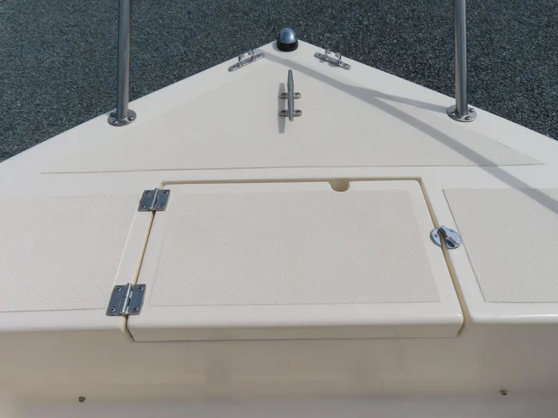 Slide: The Image of Bow of 2001 KenCraft Challenger 206 boat with storage compartment and cleat. - 13