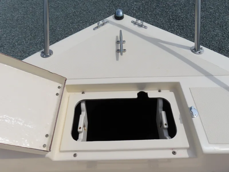 Slide: The Image of Open storage compartment on 2001 KenCraft Challenger 206 boat deck. - 14