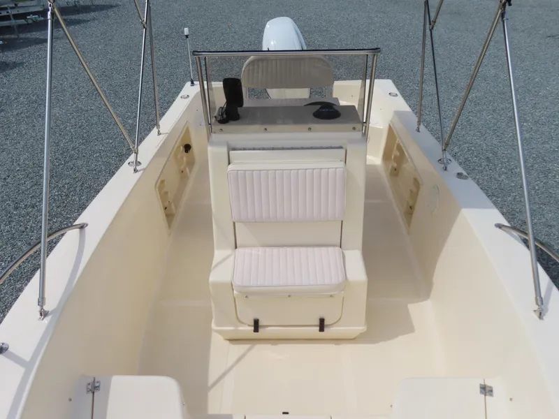 Slide: The Image of 2001 KenCraft Challenger 206 boat interior with seating and steering console. - 15