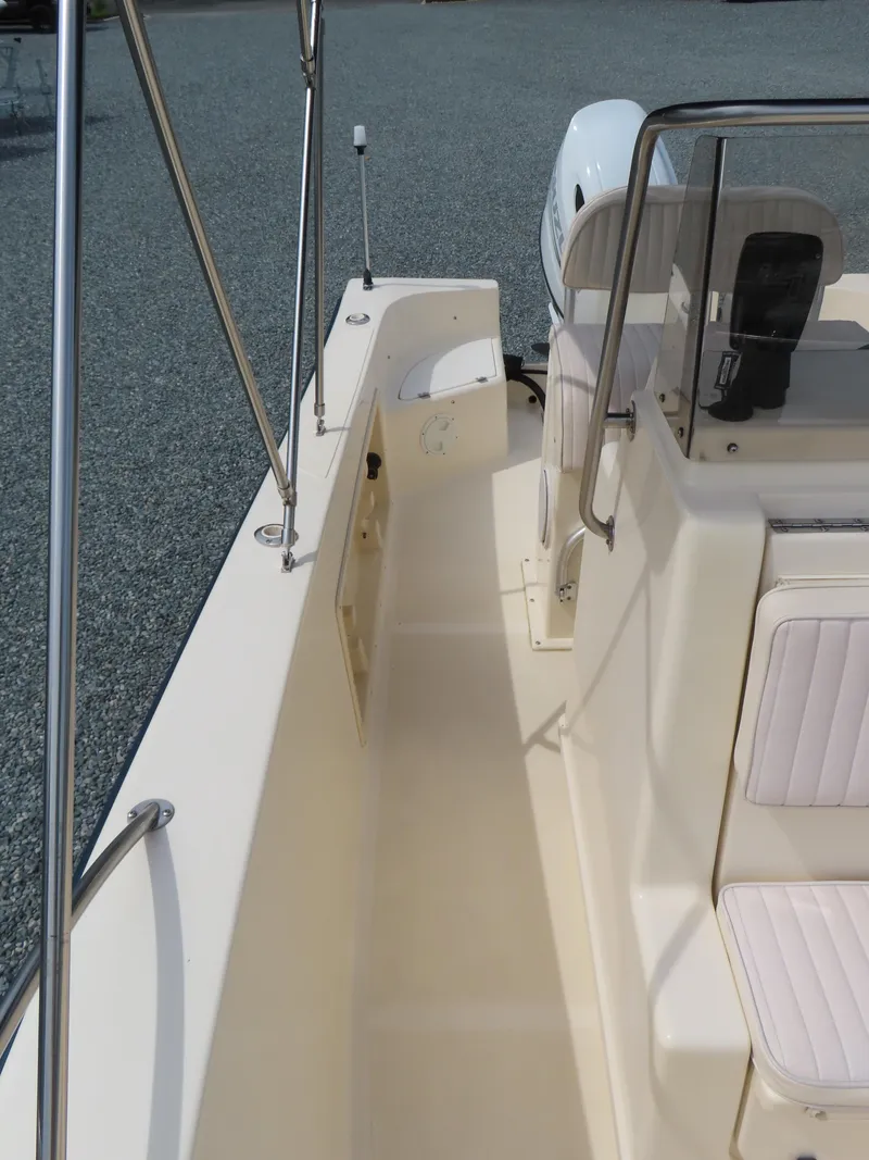 Slide: The Image of 2001 KenCraft Challenger 206 boat interior with seating and railing. - 16