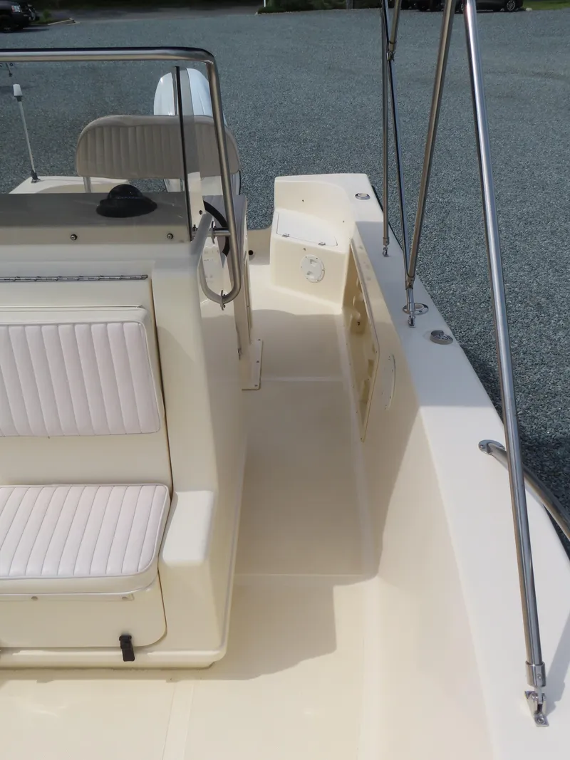 Slide: The Image of 2001 KenCraft Challenger 206 boat interior with seating and steering console. - 17