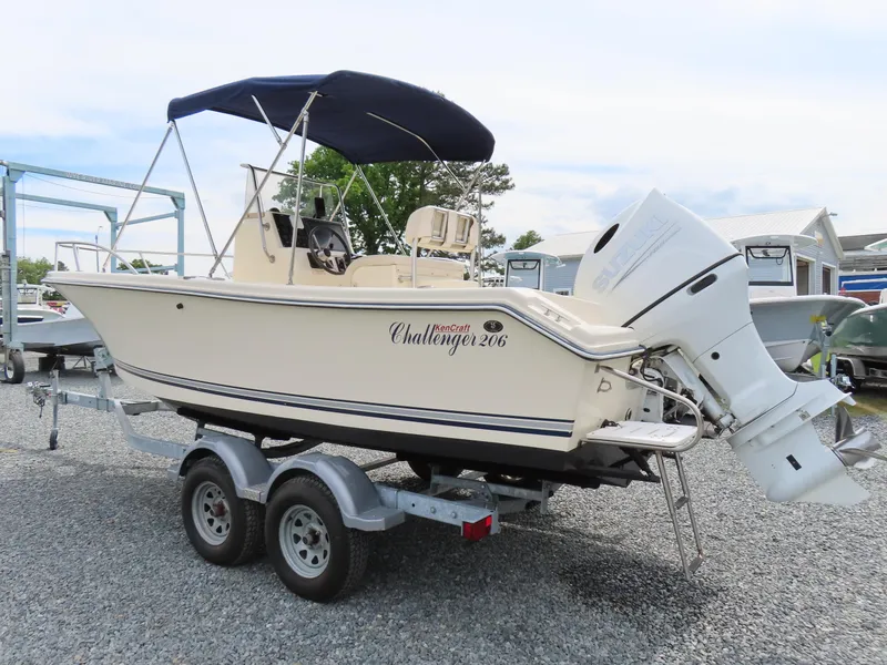 Slide: The Image of 2001 KenCraft Challenger 206 boat on trailer with canopy and outboard motor. - 2