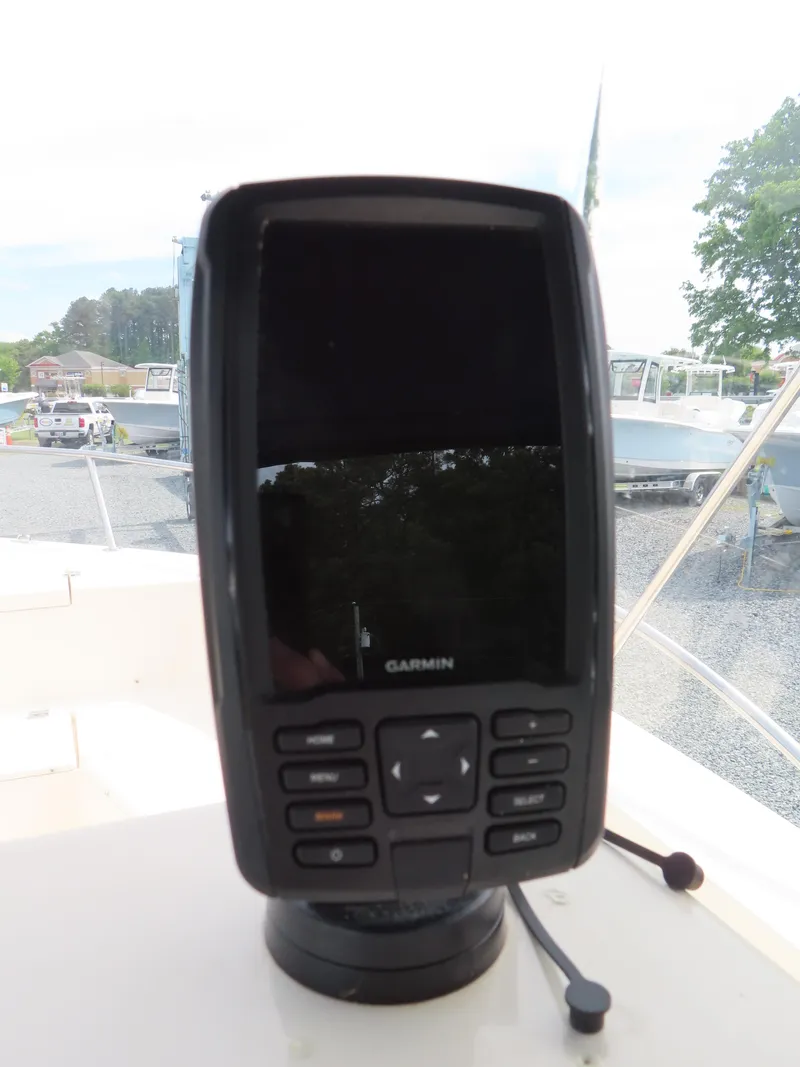 Slide: The Image of Garmin marine GPS device on KenCraft Challenger 206 boat, 2001 model. - 24