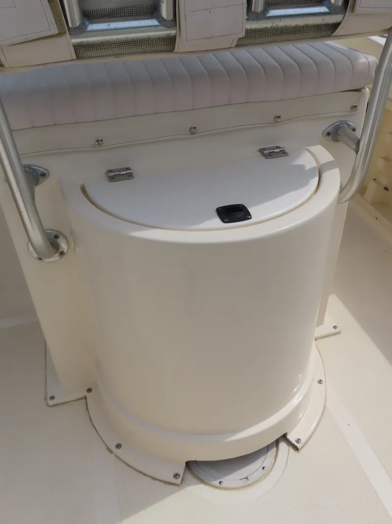 Slide: The Image of 2001 KenCraft Challenger 206 boat seating and storage compartment. - 27