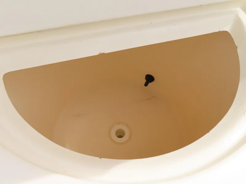 Slide: The Image of KenCraft Challenger 206 boat sink, 2001 model, beige basin with drain plug. - 28