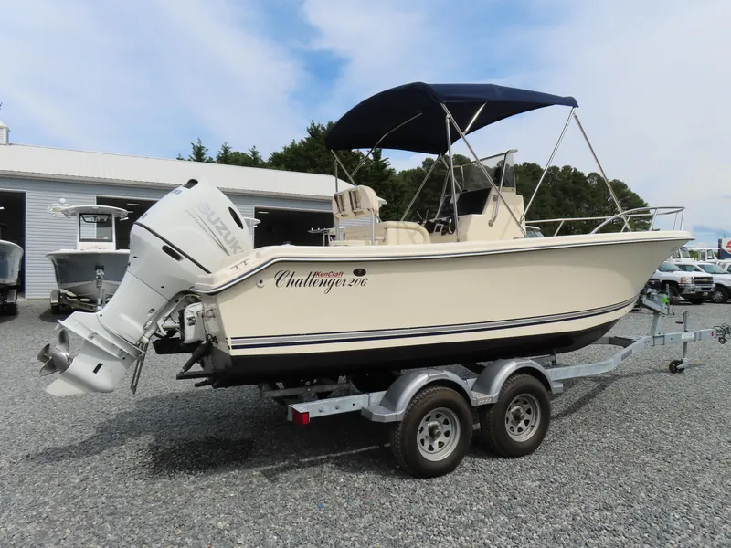 Slide: The Image of 2001 KenCraft Challenger 206 boat on trailer with outboard motor and canopy. - 3