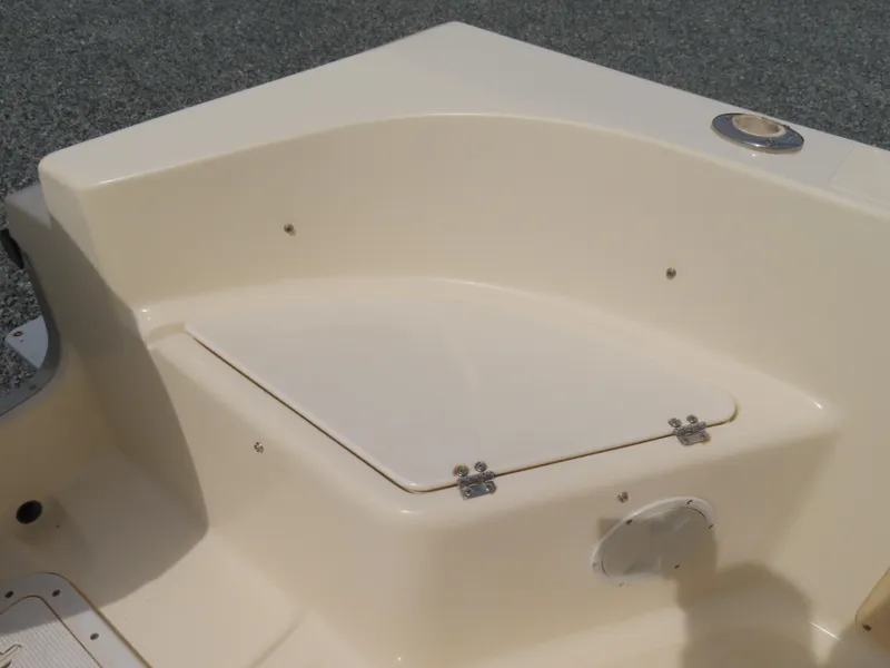 Slide: The Image of 2001 KenCraft Challenger 206 boat storage compartment with hinged lid. - 33
