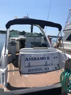 Slide: The Image of 2007 Sea Ray 310 Sundancer boat docked, named "Andiamo II," in Boston, MA. - 20