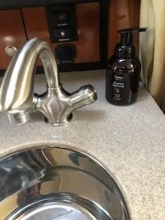 Slide: The Image of 2007 Sea Ray 310 Sundancer interior with sink and soap dispenser. - 9