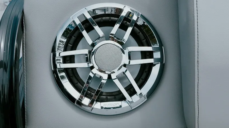 Slide: The Image of Chrome speaker detail on 2025 Tahoe Pontoon LTZ Versatile Rear Lounger. - 10