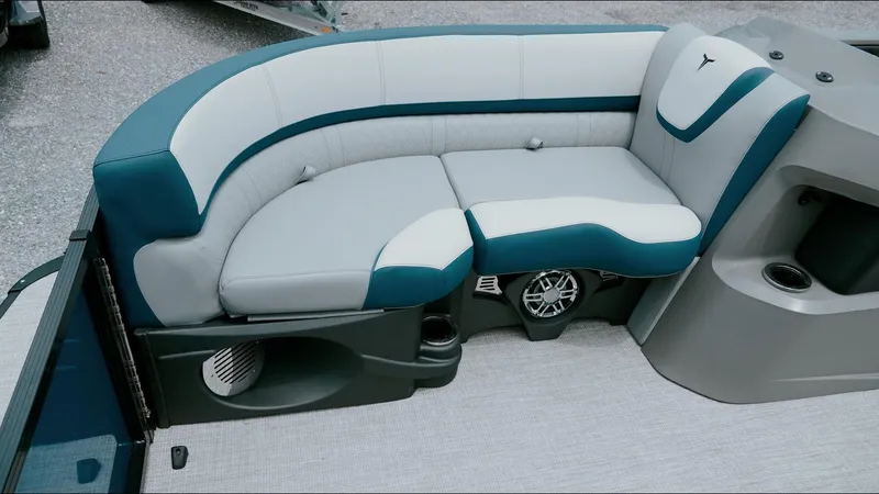 Slide: The Image of 2025 Tahoe Pontoon LTZ Versatile Rear Lounger with stylish seating and integrated speaker system. - 13