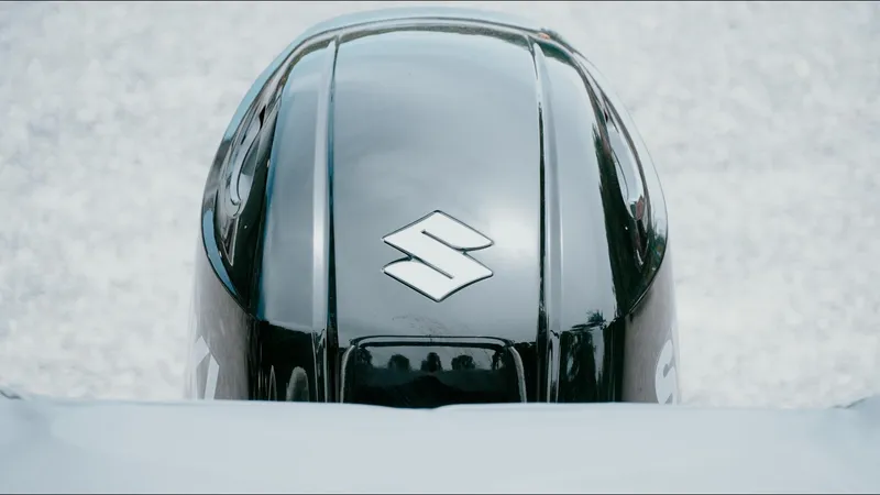 Slide: The Image of 2025 Tahoe Pontoon LTZ Versatile Rear Lounger with Suzuki outboard motor. - 17