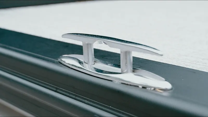 Slide: The Image of 2025 Tahoe Pontoon LTZ Versatile Rear Lounger cleat detail, sleek and modern design. - 19