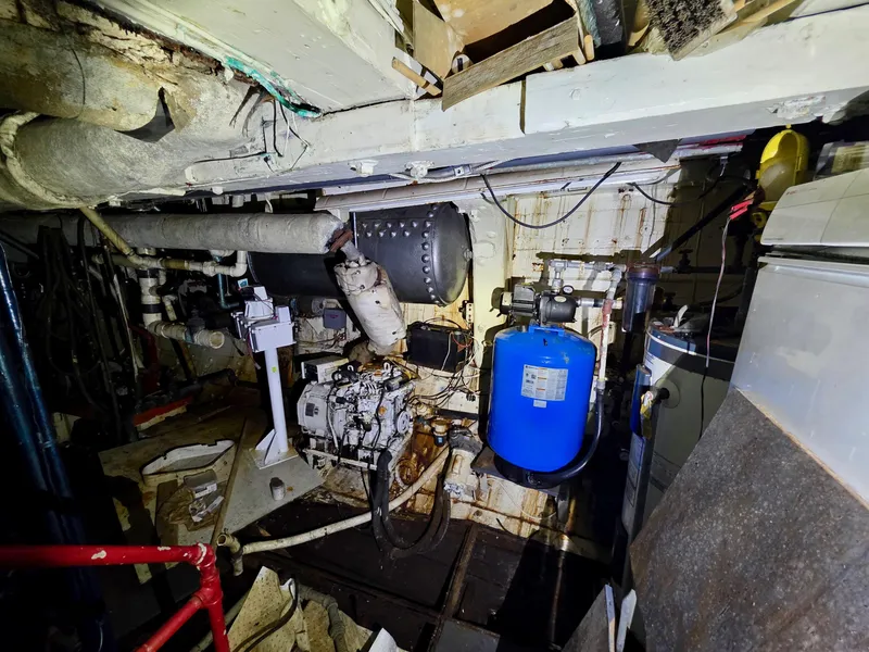 Slide: The Image of Engine room of a vintage 1890 custom tugboat, showcasing machinery and equipment. - 29