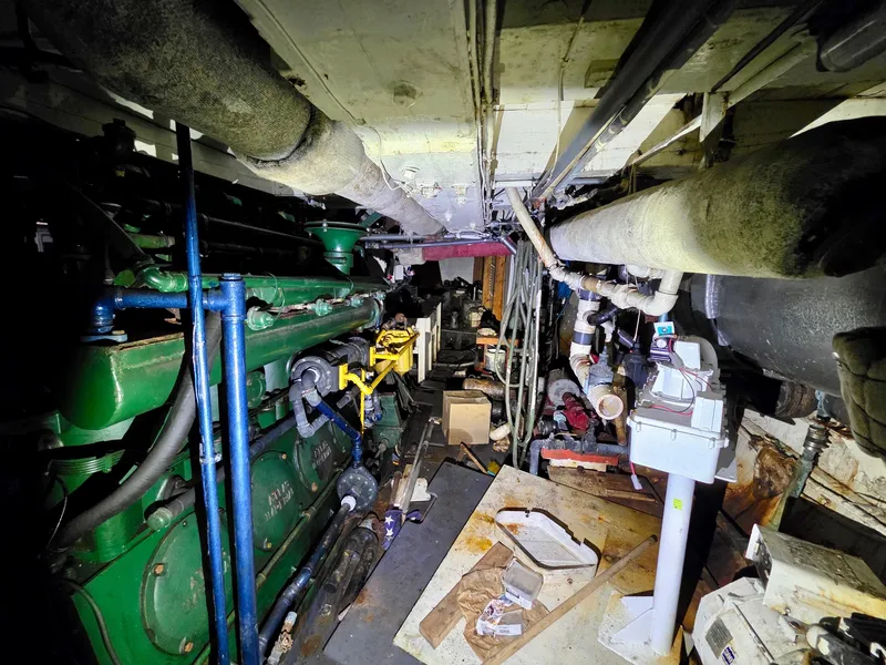 Slide: The Image of Engine room of a vintage 1890 custom tugboat with machinery and pipes. - 30