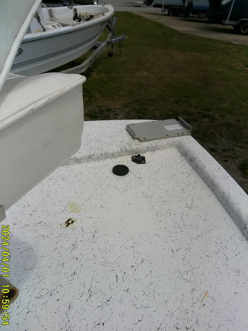 Slide: The Image of Mako 1901 boat deck, 2008 model, with visible fittings and equipment. - 11