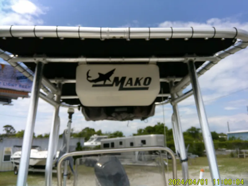 Slide: The Image of Boat canopy with Mako logo, model 1901, year 2008, outdoors under blue sky. - 13