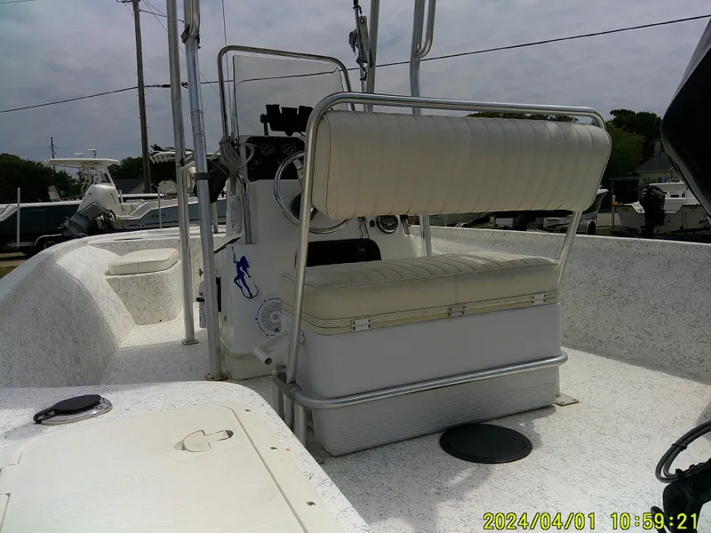 Slide: The Image of Mako 1901 boat interior, 2008 model, featuring seating and steering console. - 7