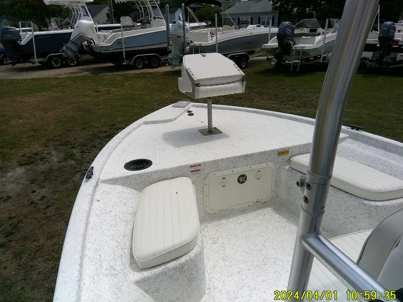 Slide: The Image of Bow view of a 2008 Mako 1901 boat with seating and fishing chair. - 8