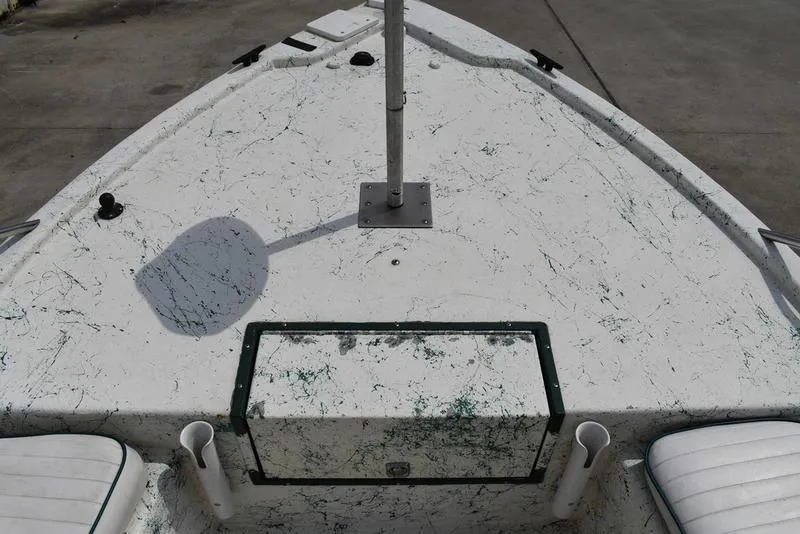 Slide: The Image of 1998 Kenner 21V CC Tunnel boat deck with white and green speckled design. - 14