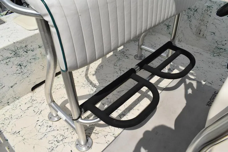 Slide: The Image of 1998 Kenner 21V CC Tunnel boat interior with footrest and seating. - 34