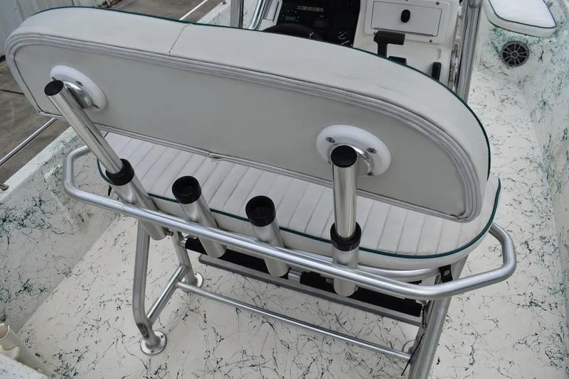 Slide: The Image of 1998 Kenner 21V CC Tunnel boat interior with rod holders and seating. - 35