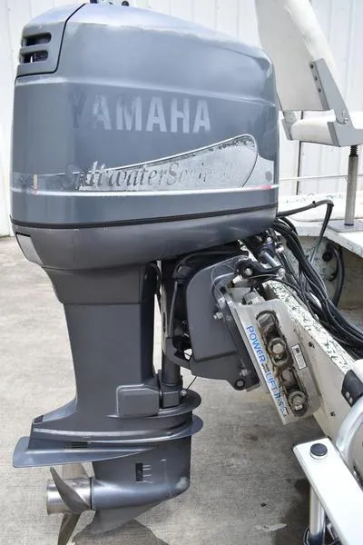 Slide: The Image of 1998 Kenner 21V CC Tunnel boat with Yamaha outboard motor, featuring Power Tech propeller. - 8