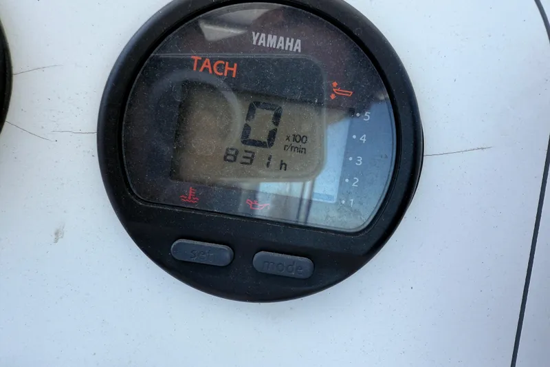 Slide: The Image of Yamaha tachometer displaying 831 hours on a 2005 Pro-Line 23 WA boat. - 14