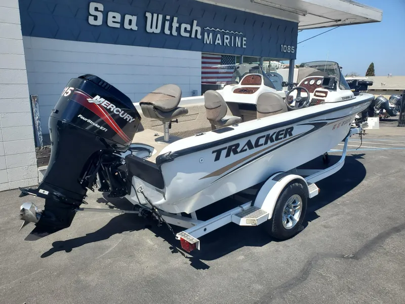 Slide: The Image of 2005 Tracker Tundra 18 DC boat with Mercury engine at Sea Witch Marine. - 2