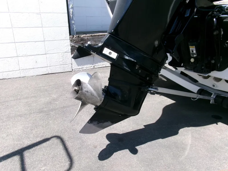 Slide: The Image of 2005 Tracker Tundra 18 DC boat motor and propeller close-up. - 28