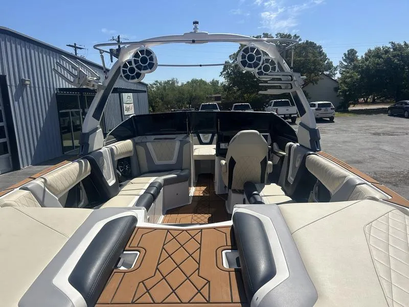 Slide: The Image of 2019 Tigé ZX5 boat interior with spacious seating and modern design. - 1