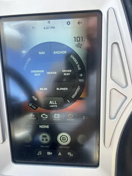 Slide: The Image of 2019 Tigé ZX5 touchscreen control panel displaying navigation and seat settings. - 5