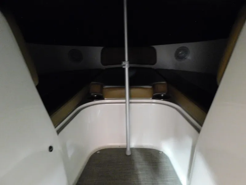 Slide: The Image of Interior cabin of a 2020 Bayliner VR 6 boat, featuring seating and storage. - 11