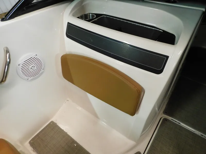 Slide: The Image of 2020 Bayliner VR 6 boat interior with speaker and storage compartment. - 9