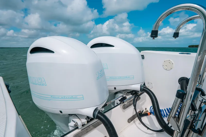 Slide: The Image of Twin Yamaha outboard motors on 2022 Panga Eduardoño Corvina boat, ocean backdrop. - 21