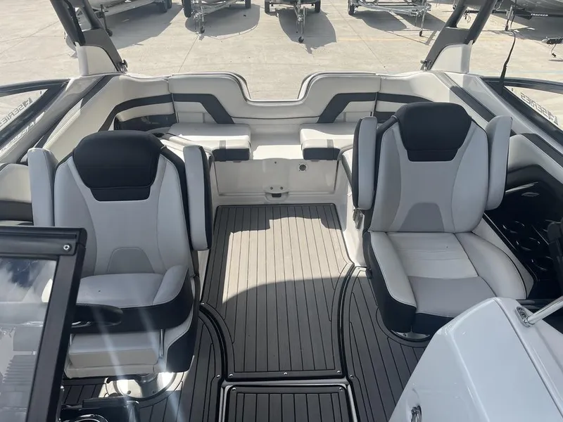 Slide: The Image of 2018 Yamaha Boats 242 Limited S E-Series interior with sleek seating and modern design. - 13