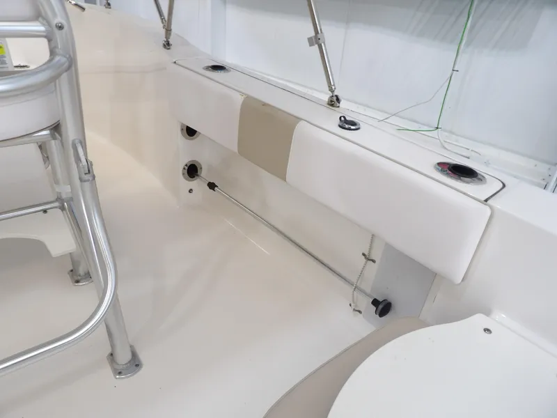 Slide: The Image of 2020 Robalo R180 boat interior with seating and stainless steel railing. - 17