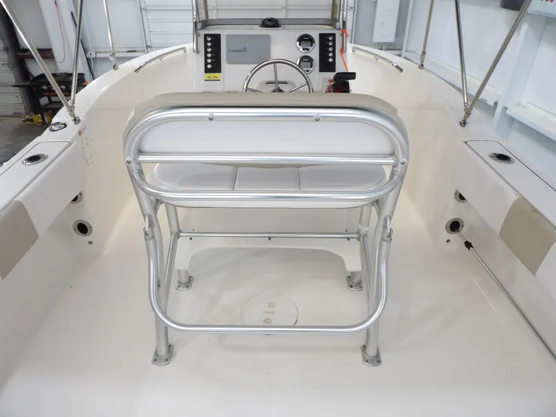 Slide: The Image of 2020 Robalo R180 boat interior with steering console and seating. - 18