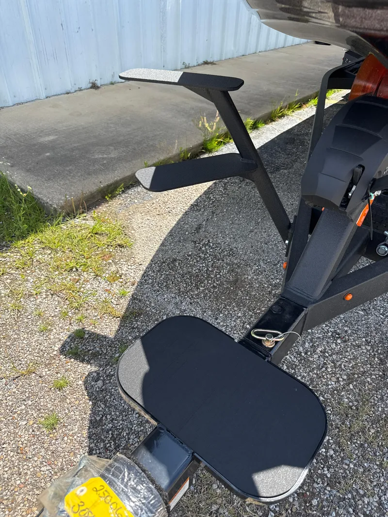 Slide: The Image of 2025 Skeeter ZXR21SE boat trailer hitch and step detail in sunlight. - 18